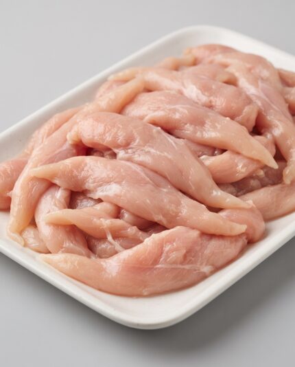 Chicken Inner Fillets — Small tapered chicken tenderloin strips, long slender muscle pieces lying loose