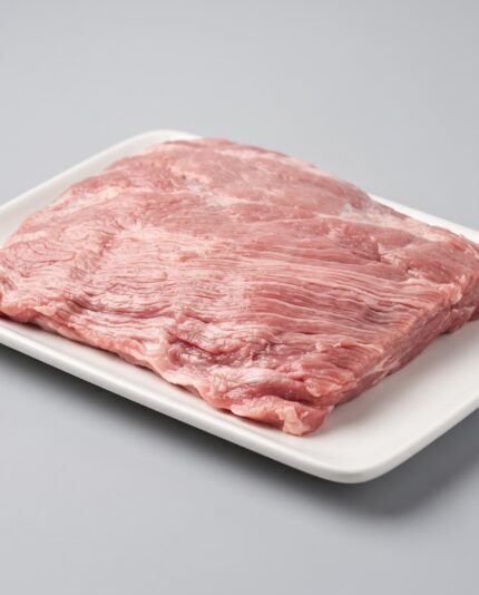 Lamb Breast — Boneless — A flat, boneless lamb breast piece, thin alternating layers of fat and lean meat, no ribs visible