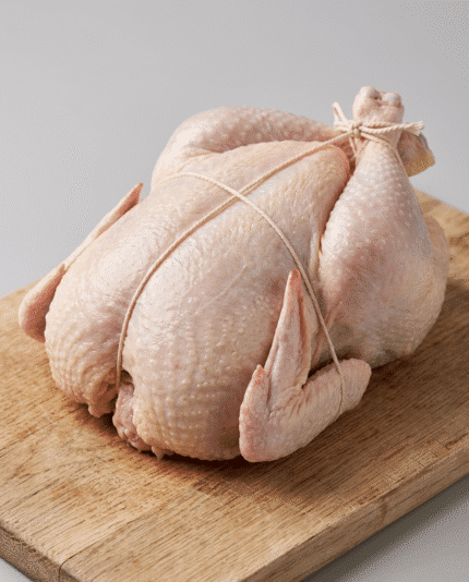 Whole Chicken 1100 on a wholesale cutting board