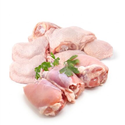Raw chicken thighs, skin on and skinless, with parsley
